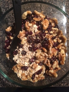 english flapjacks mixing oats walnuts dried cranberries