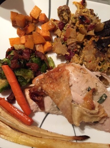 Friendsgiving meal closeup plate thanksgiving paleo turkey stuffing carrots sweet potato